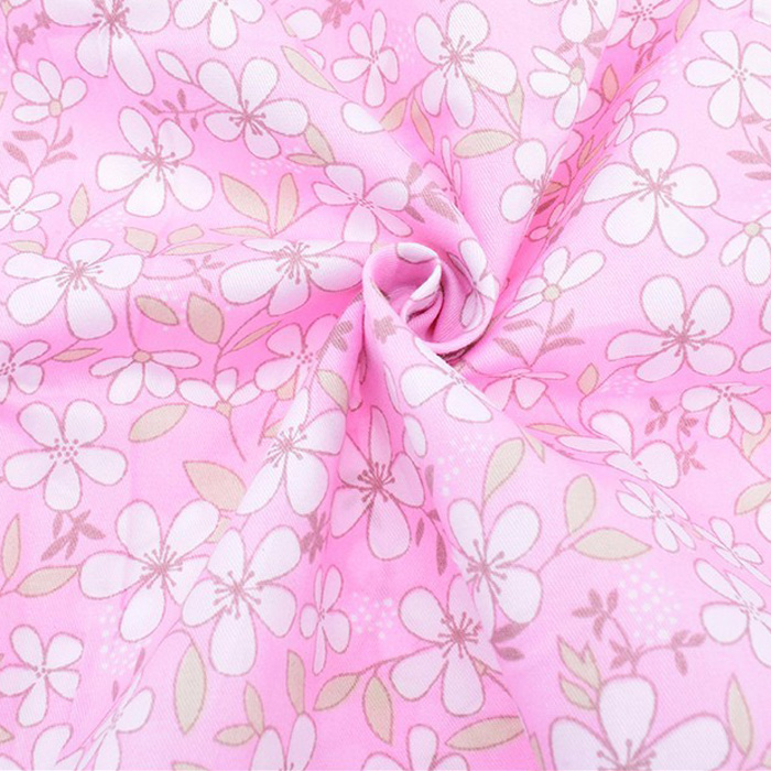Ткань "Белые нежные цветочки на розовом фоне"    