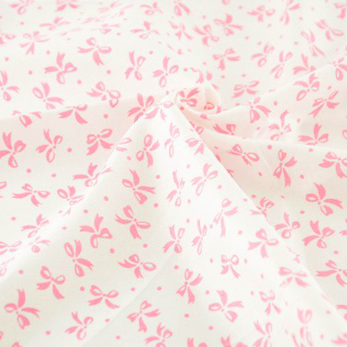 Ткань "Мелкие розовые бантики на белом фоне"   